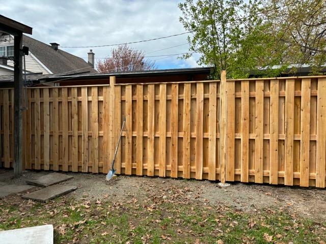 Cedar privacy fence installation in Blainville